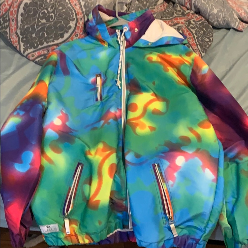 A tie dyed windbreaker size XL fits like a L